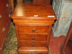 A REPRODUCTION THREE DRAWER CHEST