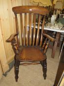 A TRADITIONAL ELM 19TH CENTURY WINDSOR ARMCHAIR