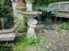 A GARDEN STONE FIGURATIVE BIRD BATH