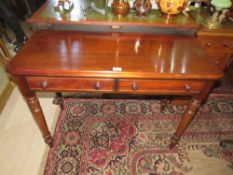 A 19TH CENTURY MAHOGANY TWO DRAWER SIDE TABLE RAISED ON TURNED SUPPORTS, W 101 cm