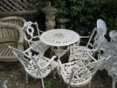 A CAST WHITE PAINTED GARDEN TABLE WITH FOUR CHAIRS
