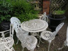 A CAST WHITE PAINTED GARDEN TABLE WITH FOUR CHAIRS