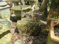 A 19TH CENTURY SANDSTONE BLOCK WITH CAST BOOTSCRAPER