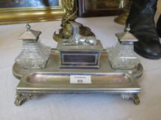 AN ANTIQUE SILVER PLATED INK / DESK STAND WITH CENTRAL SPHINX DETAIL, W 27 cm