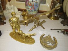 A SELECTION OF FOUR HEAVY BRASS ITEMS TO INCLUDE AN EAGLE ON BRANCH, DOG, etc. (4)