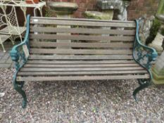 A CAST AND WOODEN GARDEN BENCH