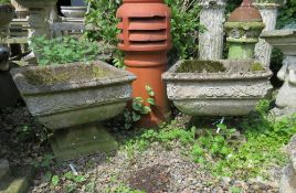 A PAIR OF SQUARE GARDEN STONE PLANTERS ON PLINTHS, H 42 cm (2)