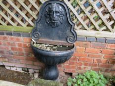 A CAST IRON LION MASK WALL WATER FEATURE, H 134 cm