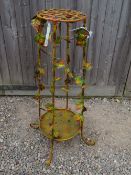 A MODERN LEAF EFFECT PLANT STAND