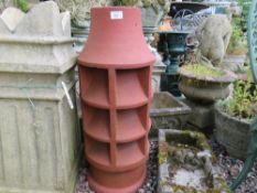A TERRACOTTA CHIMNEY POT