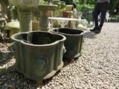 A PAIR OF CAST IRON SHAPED LOW PLANTERS, H 30 cm, W 43 cm (2)