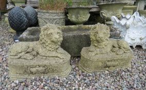 A PAIR OF STONE RECUMBENT LIONS, L 42 cm (2)