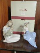 TWO BOXED NAO FIGURINES OF GIRLS