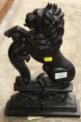 A CAST HERALDIC LION DOORSTOP