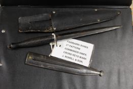 A SYKES FAIRBAIRN 3rd PATTERN COMMANDO KNIFE & WREATH WITH METAL SCABBARD