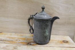A MIDDLE EASTERN STYLE METAL TANKARD