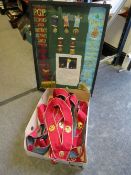 A DISPLAY CASE CONTAINING ROAB SASHES AND MEDALS RELATING TO RETFORD & DISTRICT 2012 AND