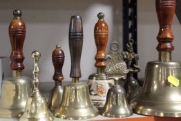 A TRAY OF COLLECTABLES TO INCLUDE ASSORTED HAND BELLS ETC