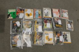 A COLLECTION OF OVER 100 FOOTBALL PROGRAMMES FROM THE 1960s, 1970s, 1980s AND 1990s TO INCLUDE