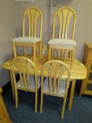 A MODERN BEECH KITCHEN TABLE AND SIX CHAIRS