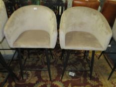 A PAIR OF TAUPE UPHOLSTERED KITCHEN STOOLS