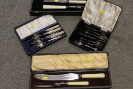 A TRAY OF ASSORTED FLATWARE TO INCLUDE CASED CARVING SETS