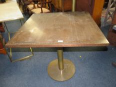 A COPPER EFFECT TOP PATIO/BISTRO TABLE