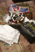 A SMALL SUITCASE OF MILITARIA BELTS, ROYAL NAVY CLOTHING, UNION FLAG ETC AND AN AMMO BOX