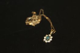 A 9CT GREEN STONE PENDANT ON CHAIN - APPROX WEIGHT 1.2 G