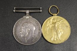 TWO WWII MEDALS AWARDED TO 29561 PTE G.W.COCKHEAD. DORSET R