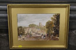 A GILT FRAMED WATERCOLOUR OF A VILLAGE SCENE