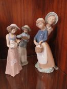 THREE ASSORTED NAO FIGURINES