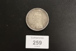 A VICTORIAN CROWN DATED 1887