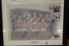 A FRAMED AND GLAZED SIGNED FIRST DAY COVER OF ENGLANDS 1966 WORLD CUP HEROES