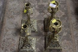 TWO PAIRS OF ORNATE PIERCED BRASS CANDLESTICKS