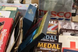 A COLLECTION OF MOSTLY WAR RELATED COLLECTABLES TO INCLUDE BOOKS AND DVD'S