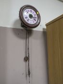 A VINTAGE MAHOGANY CASED POSTMANS WALL CLOCK - INCLUDING TWIN WEIGHTS AND PENDULUM