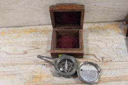 A CASED COMPASS