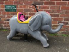 AN ELEPHANT AMUSEMENT / FAIRGROUND RIDE