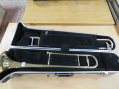 A 'BLESSING' TROMBONE IN RIGID CARRY CASE