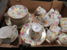 A TRAY OF CHINTZ CHINA TEAWARE BY ROYAL ALBERT