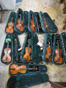 NINE ASSORTED VIOLINS IN GREEN CARRY CASES