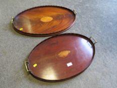TWO BRASS HANDLED INLAID WOODEN SERVING TRAYS