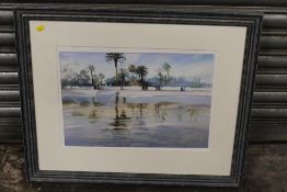 A FRAMED AND GLAZED WATERCOLOUR OF A DESSERT WATERING HOLE BY TREVOUR WAUGH ENTITLED REFLECTIONS