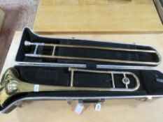 AN OLDS TROMBONE IN FITTED CARRY CASE