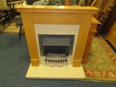 A MODERN 'KATELL' ELECTRIC FIRE AND SURROUND