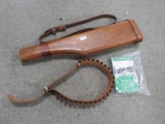 A LEG OF MUTTON LEATHER AND CANVAS SHOTGUN CASE TOGETHER WITH A 12 GAUGE CARTRIDGE LEATHER BELT