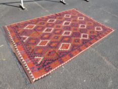 A LARGE MODERN WOOLEN RUG
