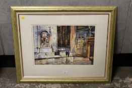 A FRAMED AND GLAZED WATERCOLOUR OF 'INSIDE THE FRARI - VENICE ' BY TREVOUR WAUGH DETAILED AND SIGNED