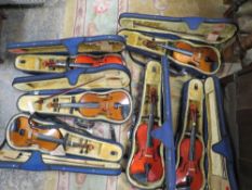 SIX ASSORTED VIOLINS IN BLUE CARRY CASES
